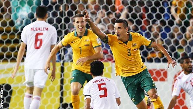 Jason Davidson (right) celebrates after scoring Australia's second goal
