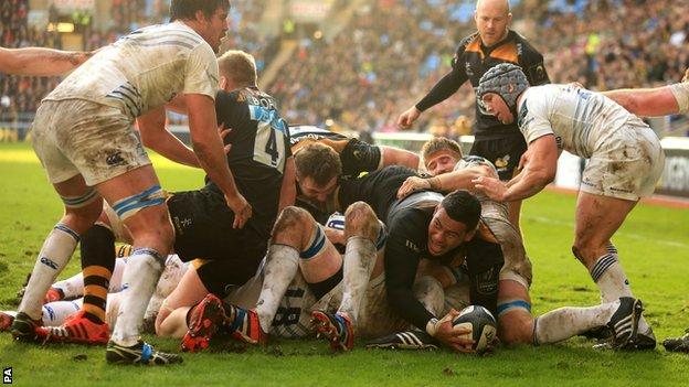 Loose forward Nathan Hughes dives over to claim Wasps' second try against Leinster at the Ricoh Arena