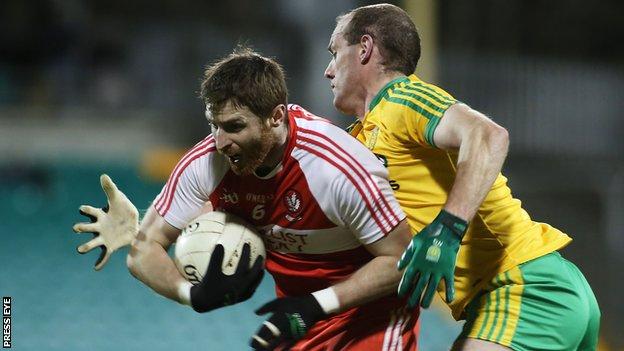 Donegal's Neil Gallagher challenges Derry's Gerard O'Kane at Ballybofey