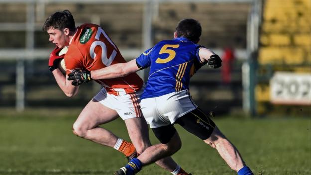 Armagh's Neil McDonald peels away from Seamus Kennedy of Tipperary as the Orchard County emerge 2-08 to 0-13 victors at the Athletic Grounds