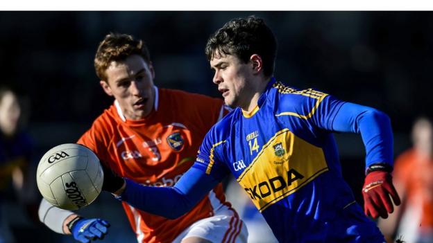 Charlie Vernon closes in on Michael Quinlivan during Armagh's Division Three win over Tipperary