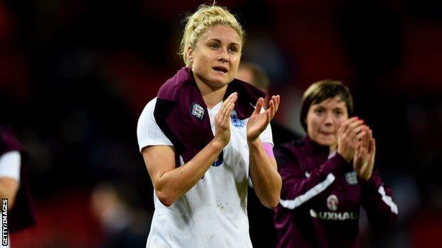 Steph Houghton (left) applauds fans at Wembley