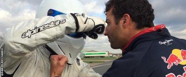 Daniel Ricciardo and The Stig square up on the racetrack