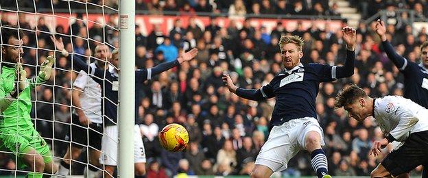 Derby's Jeff Hendrick (far r) scores his second goal against Bolton Wanderers