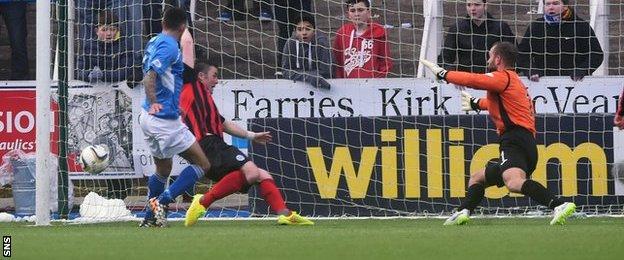 Derek Lyle strikes from close range to give Queen of the South the lead
