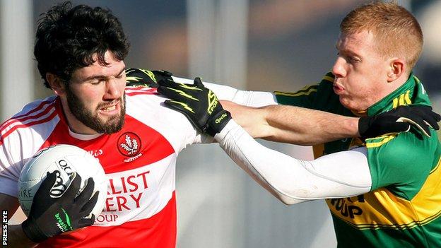 Derry's Daniel Heavron is challenged by Pa Kilkenny of Kerry at Celtic Park
