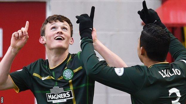 Liam Henderson (left) celebrates scoring for Celtic