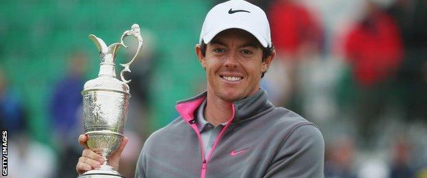 Rory McIlroy holds the Claret Jug