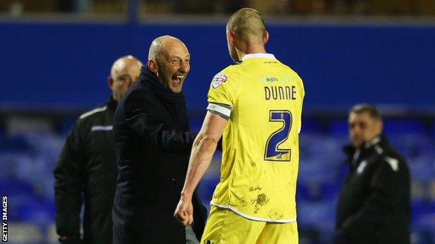 Alan Dunne (right) celebrates with Ian Holloway