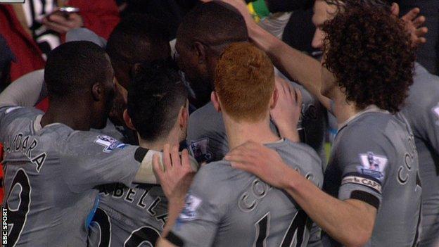 Newcastle celebrate Papiss Cisse's goal