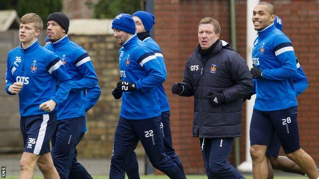 Kilmarnock manager Gary Locke with his players in training
