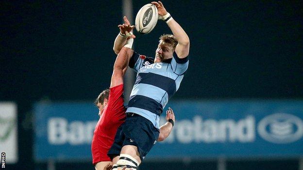 Cardiff's Macauley Cook outjumps Munster's Dave O'Callaghan in a line-out