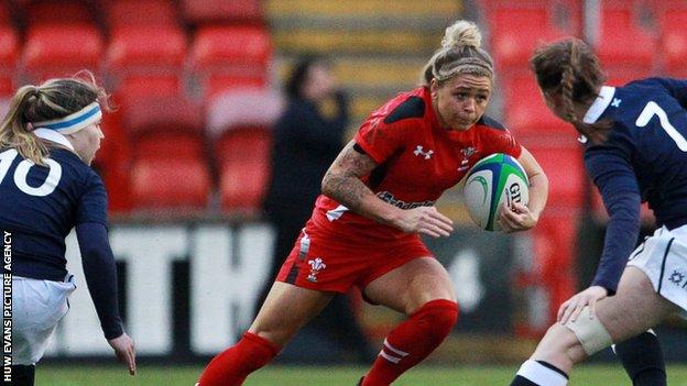 Adi Taviner of Wales on the attack against Scotland women