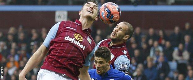 Ciaran Clark and Ron Vlaar challenge Andrej Kramaric