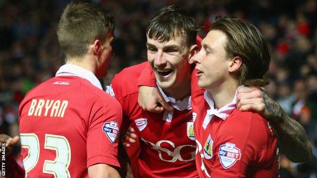 Aden Flint celebrates scoring for Bristol City