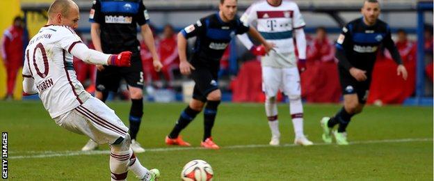 Arjen Robben scores a penalty