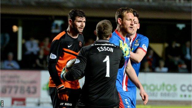 Goalkeeper Ryan Esson tries to keep Nadir Ciftci and Inverness defender Gary Warren