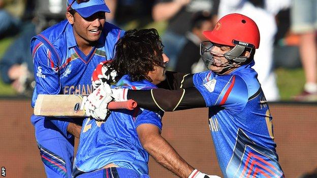 Afghanistan players celebrate their dramatic win against Scotland in Dunedin