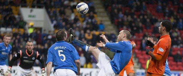 St Johnstone's Frazer Wright required treatment after an accidental clash with team-mate Steven Anderson