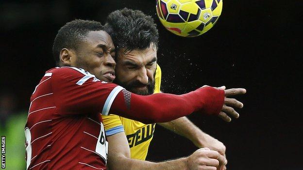 Crystal Palace's Mile Jedinak (right) and West Ham's Diafro Sakho