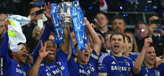 Chelsea players celebrate winning the League Cup