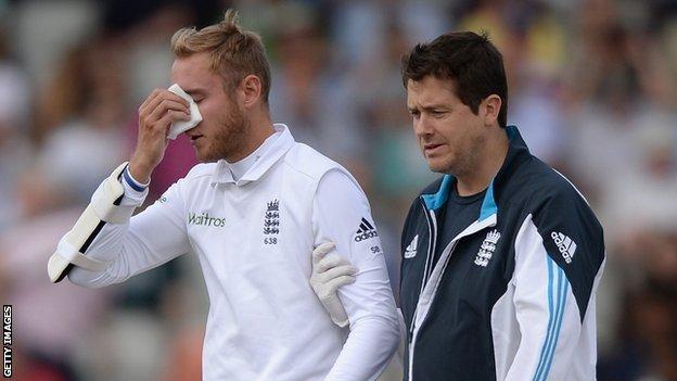 Stuart Broad is escorted from the field after his injury