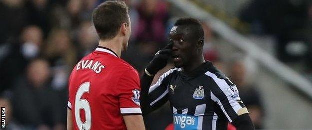 Jonny Evans and Papiss Cisse