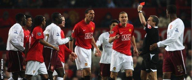 Emmanuel Eboue is sent off against Manchester United in 2008.