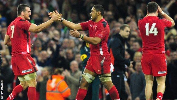 Wales players celebrate after beating South Africa in November