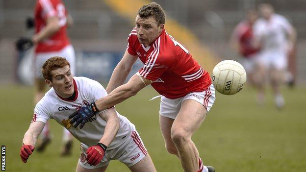 Tyrone's Peter Harte battles with Cork's Brian Hurley at Healy Park