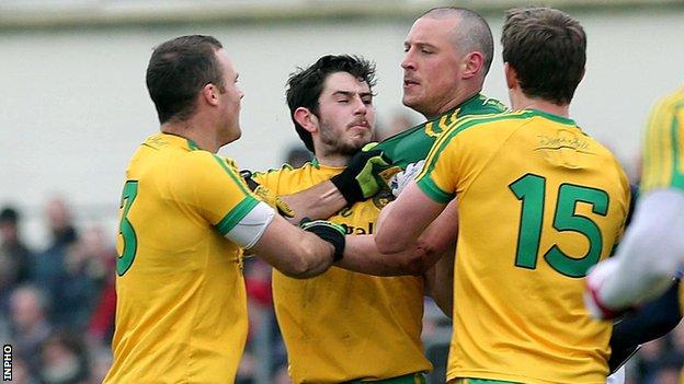 Neil McGee grabs Kieran Donaghy's jersey in the Tralee clash