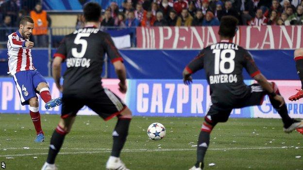 Atletico Madrid's Mario Suarez scores the opening goal