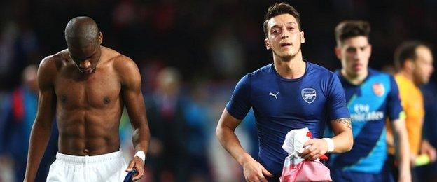Monaco defender Geoffrey Kondogbia and Arsenal's Mesut Ozil swapped shirts at half-time