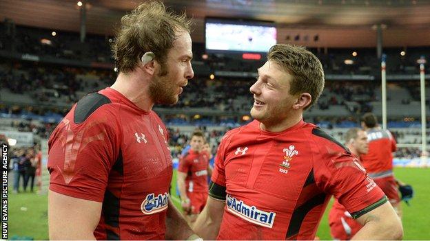Alun Wyn Jones (L) and Dan Biggar chatting after Wales' win over Ireland in March 2015