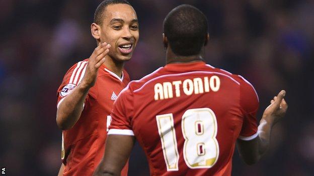 Dexter Blackstock (left) celebrates with fellow goalscorer Michail Antonio
