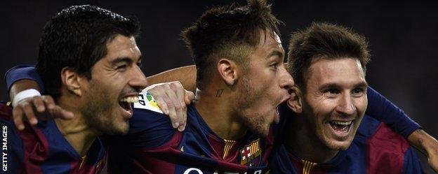Luis Suarez, Neymar and Lionel Messi celebrate a goal