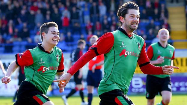 Curtis Allen celebrates with Glentoran team-mates after scoring the goal which secured a 1-0 win over Crusaders in the Irish Cup semi-finals