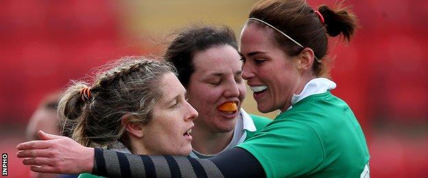 Ireland's Alison Miller celebrates a try with Nora Stapleton and Paula Fitzpatrick