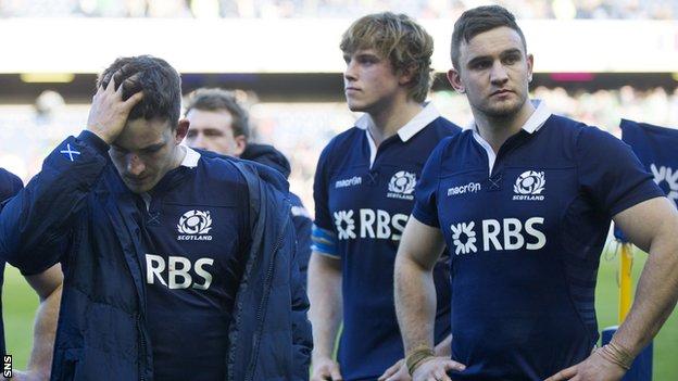 Scotland players show their disappointment against Ireland