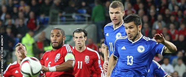Ashley Williams (left) for Wales versus Bosnia