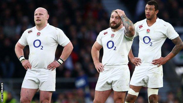 Dan Cole (right) and his England colleagues deal with Saturday's disappointment against France
