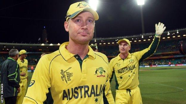 Australian captain Michael Clarke (L) and wicketkeeper Brad Haddin leave the field after defeating India