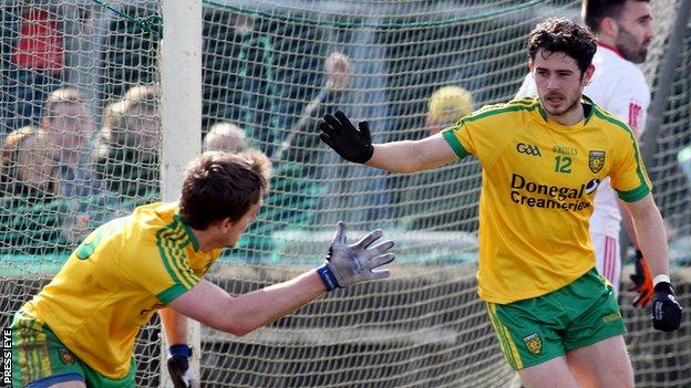 Ryan McHugh is about to be congratulated by Hugh McFadden after scoring Donegal's goal at Ballybofey
