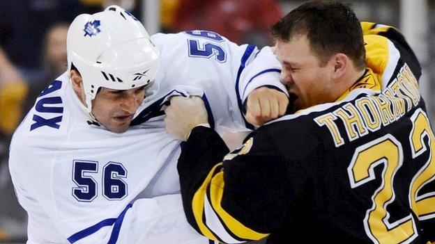 Andre Deveaux (left) playing for Toronto