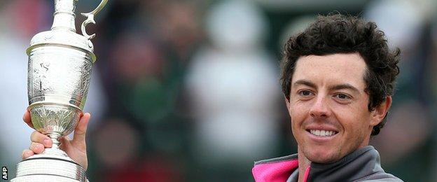 Northern Ireland's Rory McIlroy holds up the Claret Jug after winning the 2014 Open Championship at Royal Liverpool in Hoylake