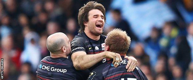 Marcelo Bosch is held aloft by his Saracens team-mates after kicking the winning penalty