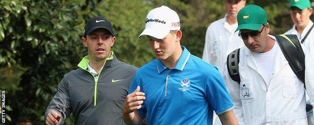 Rory McIlroy and Bradley Neil chat at Augusta