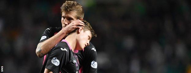 James Craigen is consoled by Frederic Frans after being sent off