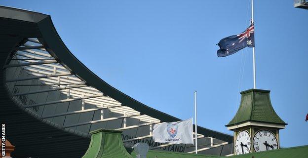 Australian flag flying at half mast