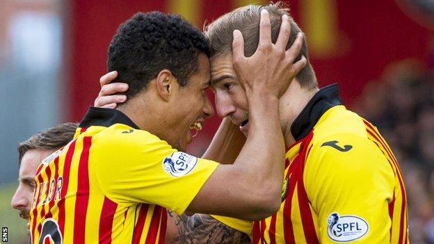 Lyle Taylor (left) scored a double for Partick Thistle in a 2-0 win over Motherwell